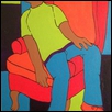 Boy In Orange Chair